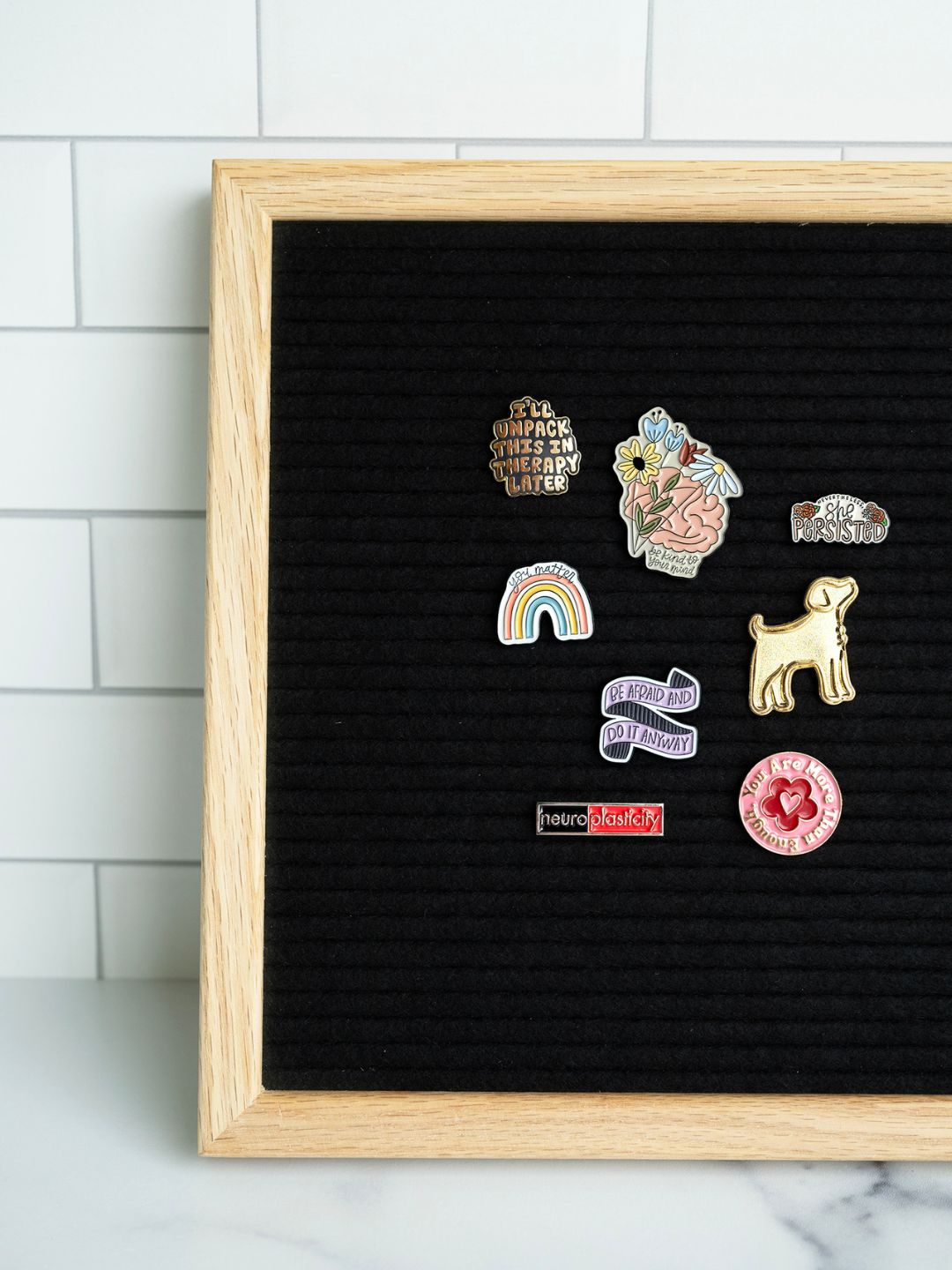 Saw a video on how to display enamel pins in a binder and decided to give  it a shot! Here is how it looks so far! : r/EnamelPins
